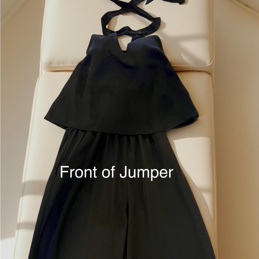 Tyche Teardrop Keyhole Black Halter Jumpsuit is a classic & ties behind neck.